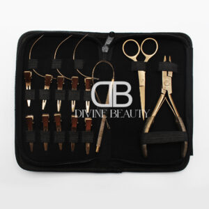 Professional rose gold hair extension tool kit with glitter grip pliers, precision scissors, sectioning clips, threading loop tool, and micro ring extension accessories in a premium black carrying case.